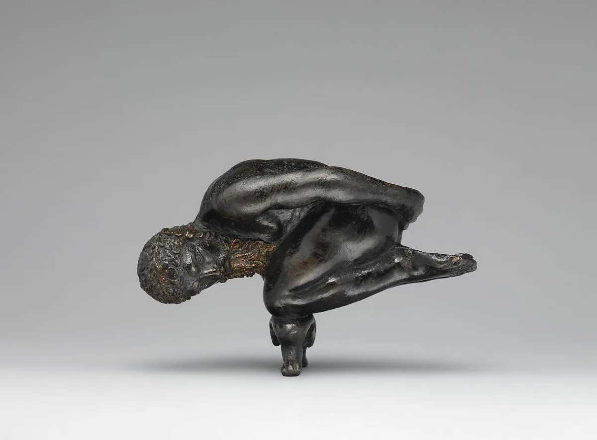 Oil lamp in the form of a bearded athlete balanced on his knees — Agostino Zoppo