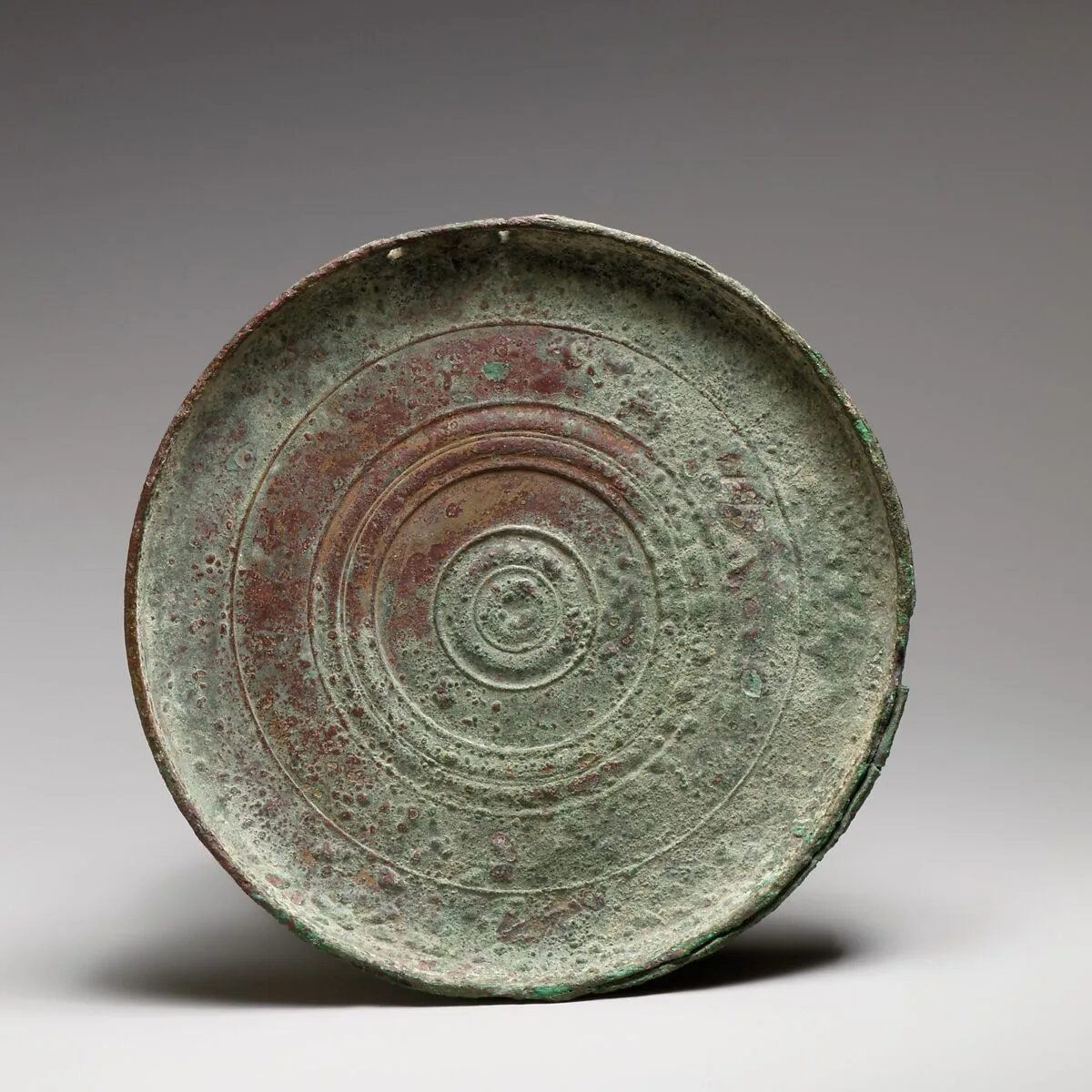 Part of a bronze box mirror — Unknown