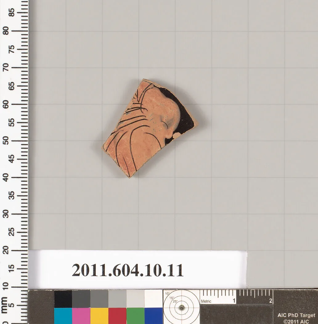 Terracotta fragment of a stemless kylix (drinking cup)? — Unknown
