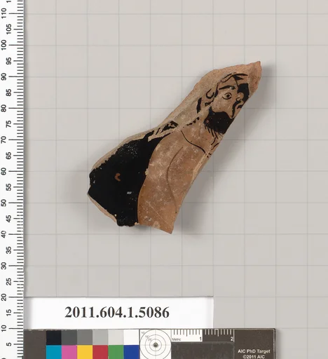 Terracotta fragment of a kylix (drinking cup)
