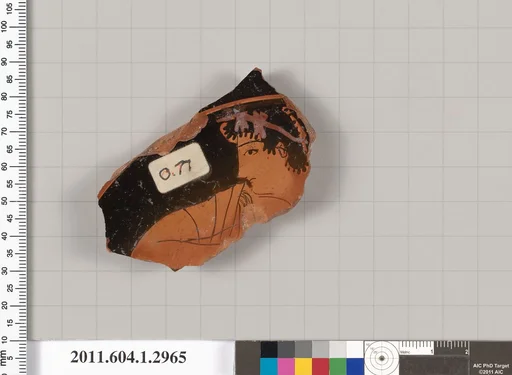 Terracotta fragment of a kylix (drinking cup)
