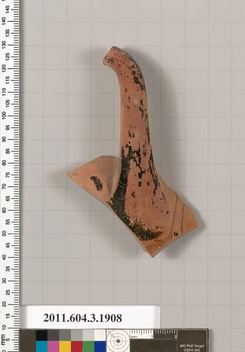 Terracotta fragment of a kylix (drinking cup)