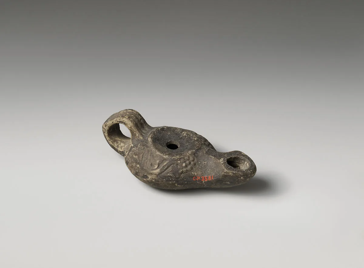 Terracotta oil lamp — Unknown
