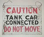 [Stenciled Sign: "Caution Tank Car Connected, Do Not Move"]