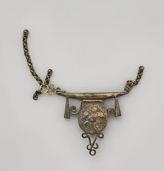 Necklace: Pendant (?) — Unknown