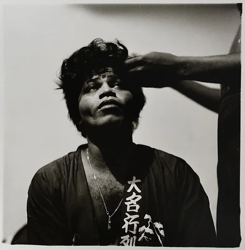 James Brown at home in curlers, Queens, N.Y.