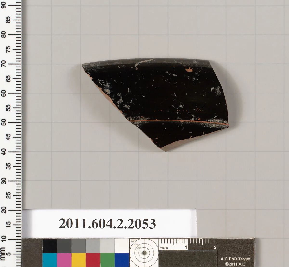 Terracotta fragment of a lid? — Unknown
