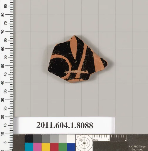 Terracotta fragment of a kylix (drinking cup)