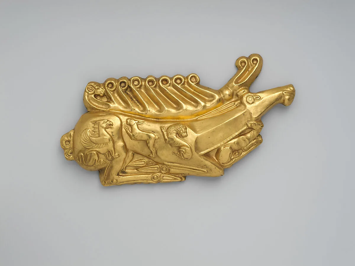 Reproduction of a Scythian plaque in the form of a reclining stag — Unknown