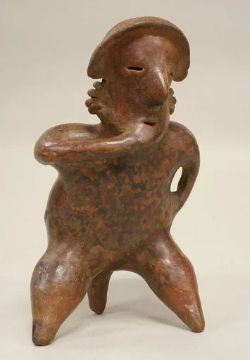 Figure on Stool
