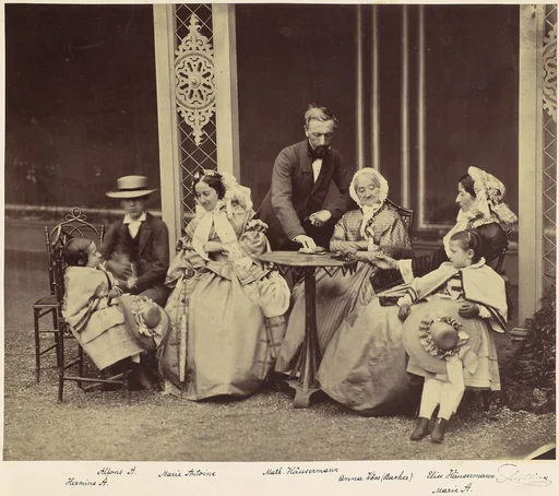 [Group Portrait of Five Adults and Two Children in a Garden]
