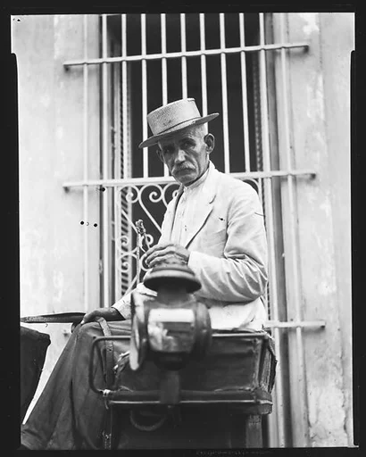 [Man in Seat of Horse-Drawn Carriage, Havana]