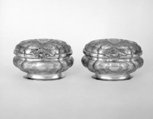 Small oval box with cover (one of a pair)