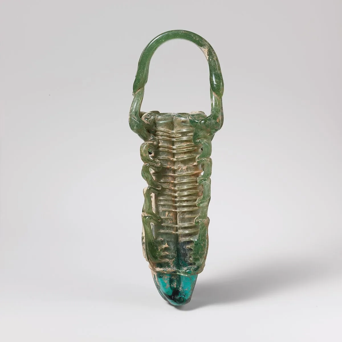 Glass cosmetic flask with four compartments (kohl tube) — Unknown