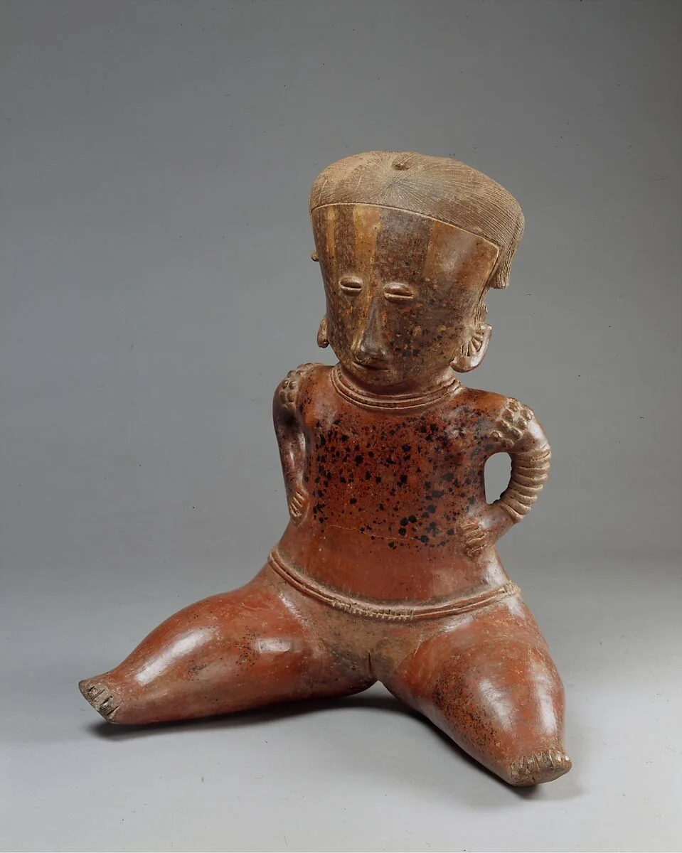 Seated Female Figure — Unknown