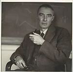 [Robert Oppenheimer Seated in Front of Blackboard]