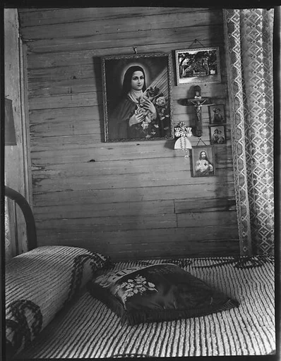 [Bedroom Interior with Religious Pictures on Wall, Shrimp Fisherman's House, Biloxi, Mississippi]