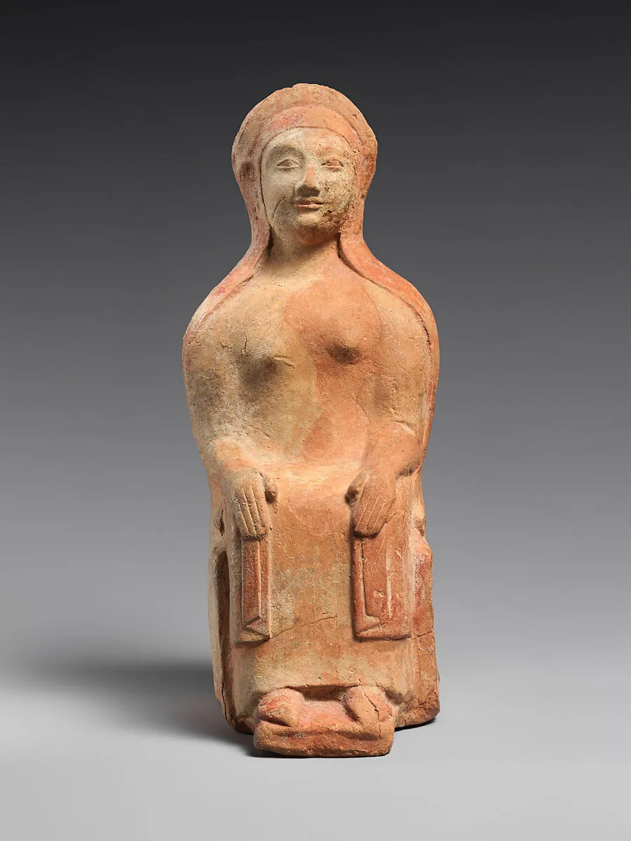 Terracotta statuette of a seated woman — Unknown