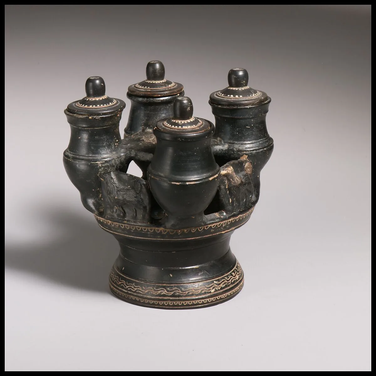 Terracotta kernos (vase for multiple offerings) — Unknown