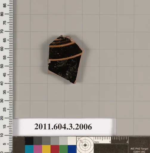 Terracotta fragment of a kylix (drinking cup)
