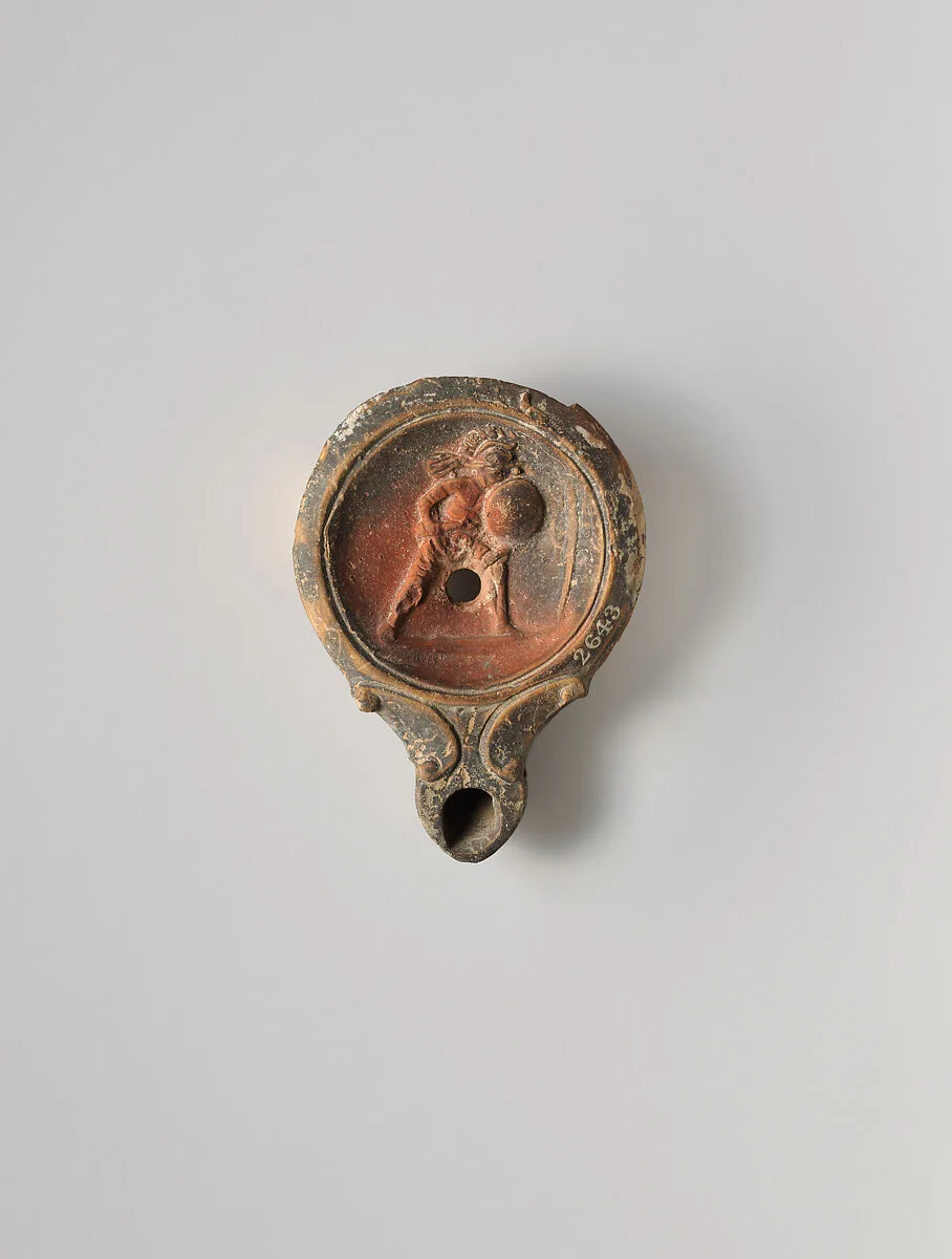 Terracotta oil lamp — Unknown