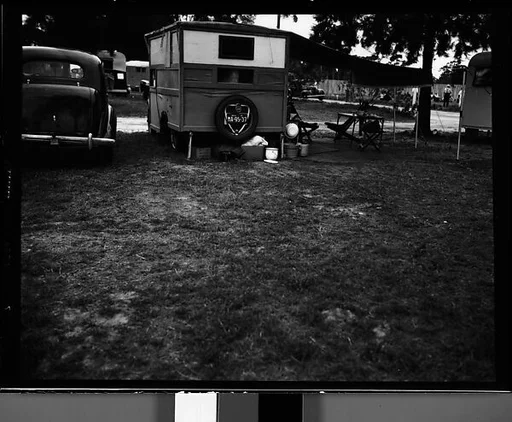 [Trailer with Canopy and Chairs in Camp, Florida]