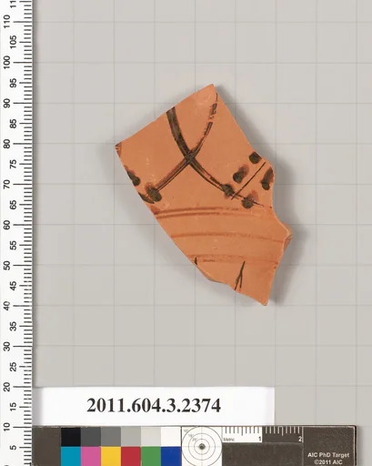 Terracotta fragment of a kylix: eye-cup (drinking cup)