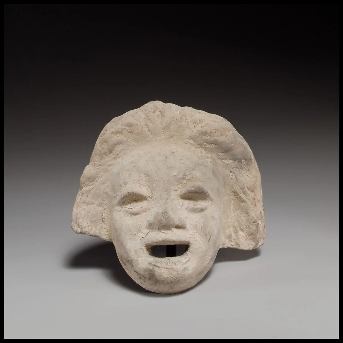 Terracotta comic mask — Unknown