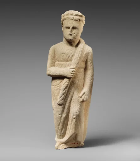 Limestone statuette of a boy