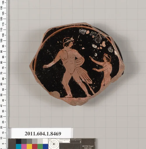 Terracotta fragment of a stemless kylix (drinking cup)