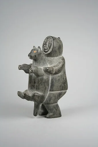 Stone Male in Parka Holding Animal