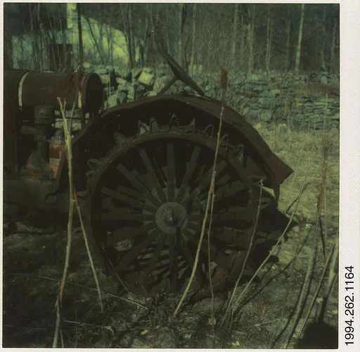 [Auto Junkyard, Old Lyme, Connecticut: Tractor Wheel]