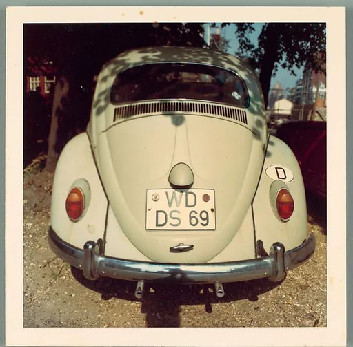[Back of Volkswagen Beetle, England]