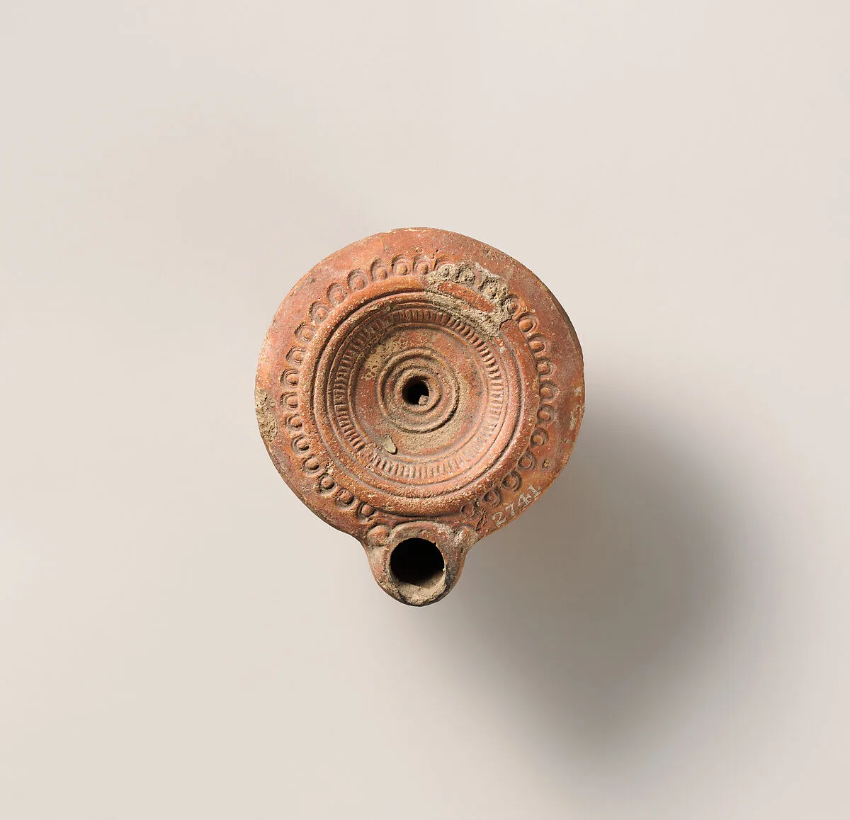 Terracotta oil lamp — Unknown