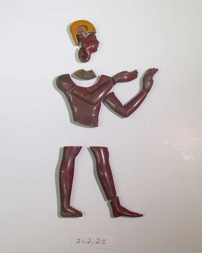 Inlays from shrine: crown, head, broad collar, pair of legs