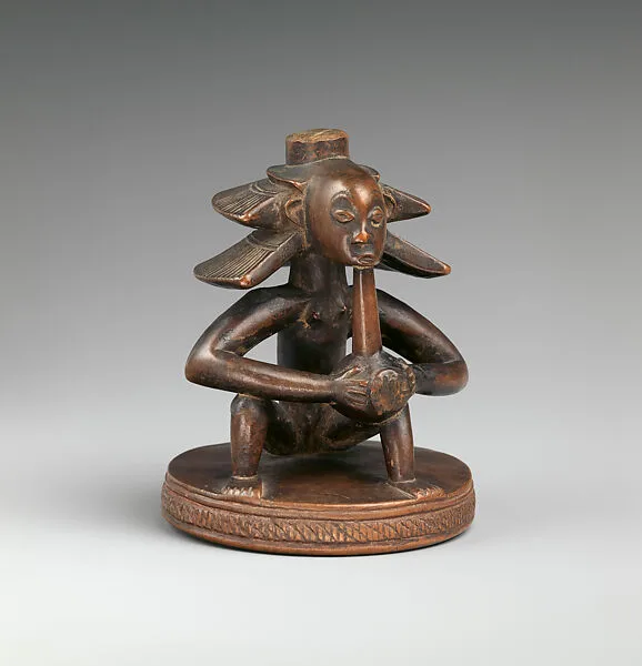 Headrest Base: Seated Female Figure — Master of the Cascade Coiffure