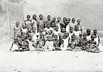 Thirty-one girls and a Koranic master (?) — Unknown