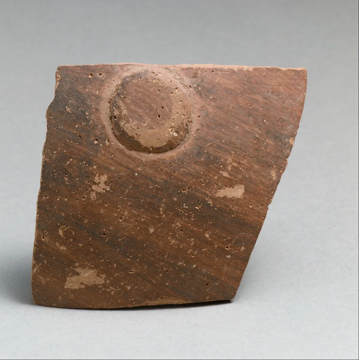 Terracotta vessel fragment with boss — Unknown