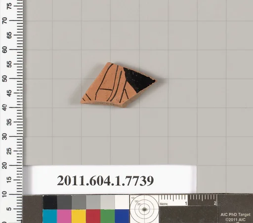 Terracotta fragment of a kylix (drinking cup)
