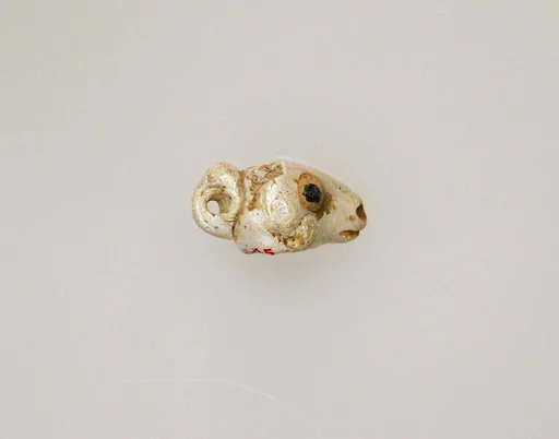 Glass pendant in the form of a ram's head