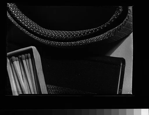 [Fabric, Matchsticks, and Book Binding]