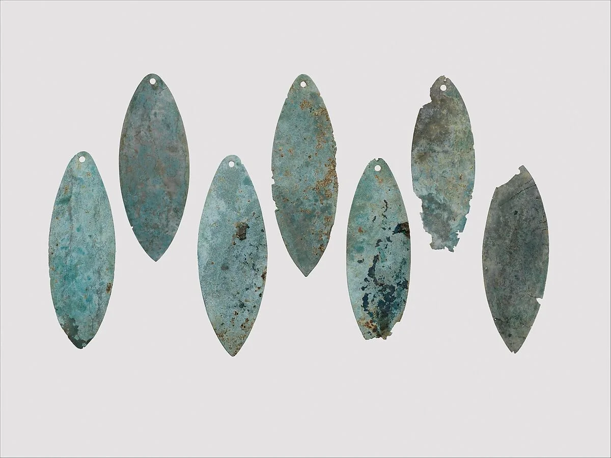 Bronze elliptical leaf, perhaps a waist ornament — Unknown