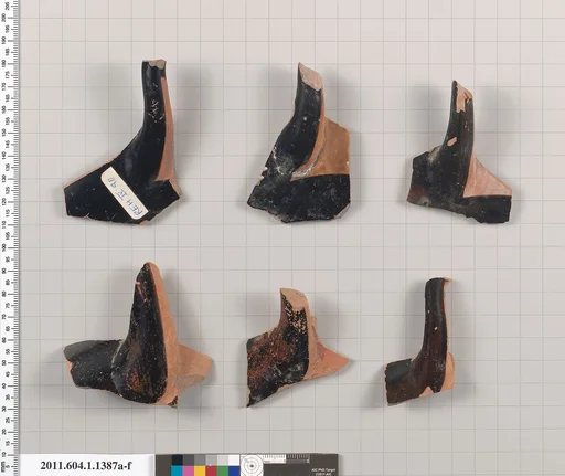 Terracotta fragments of kylikes (drinking cups)