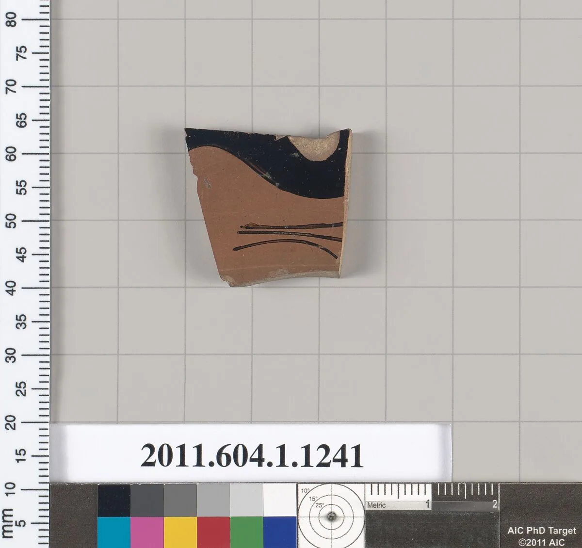 Terracotta fragment of a kylix (drinking cup) — Oltos