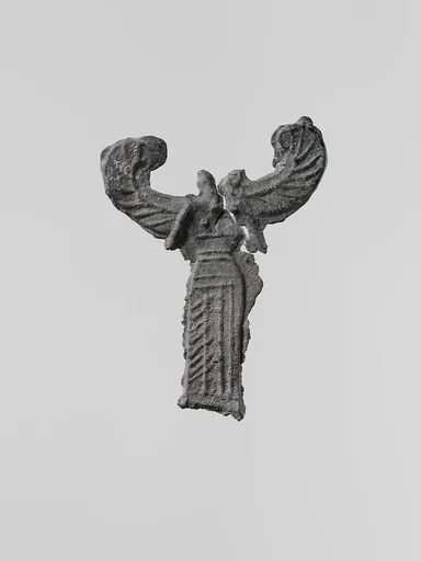 Lead figure of a winged goddess, possibly Artemis Orthia