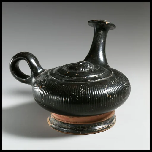 Terracotta guttus (flask with handle and vertical spout)