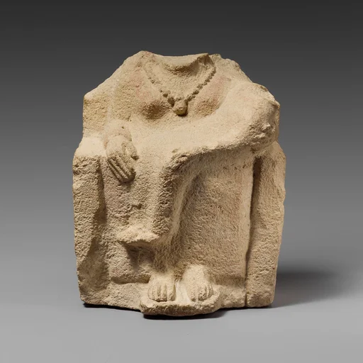 Seated limestone kourotrophos