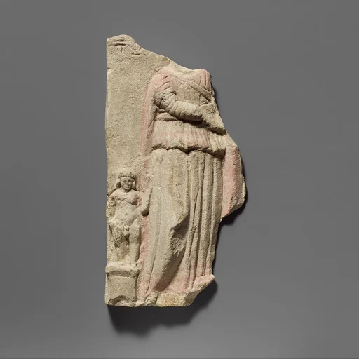 Limestone votive relief fragment