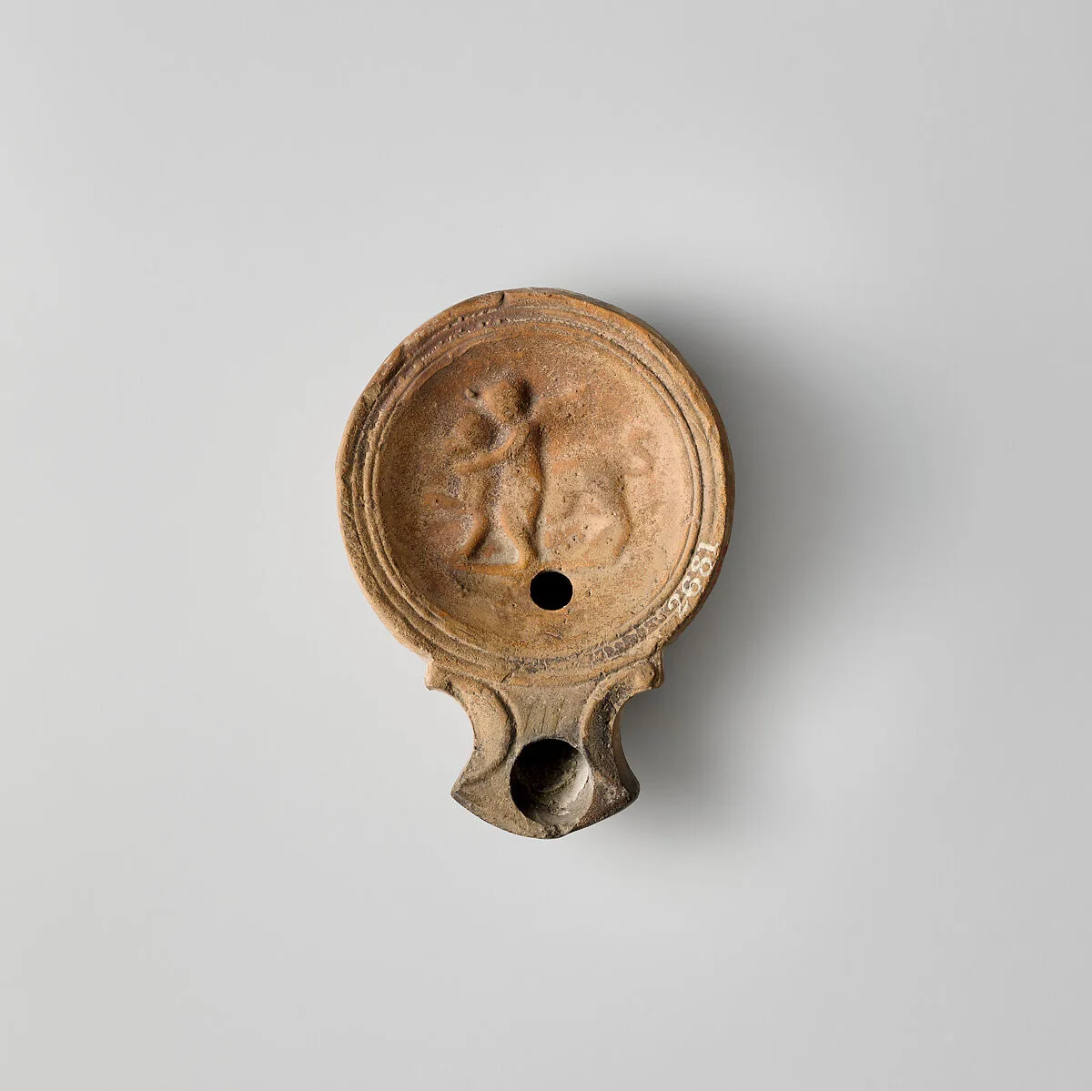 Terracotta oil lamp — Unknown