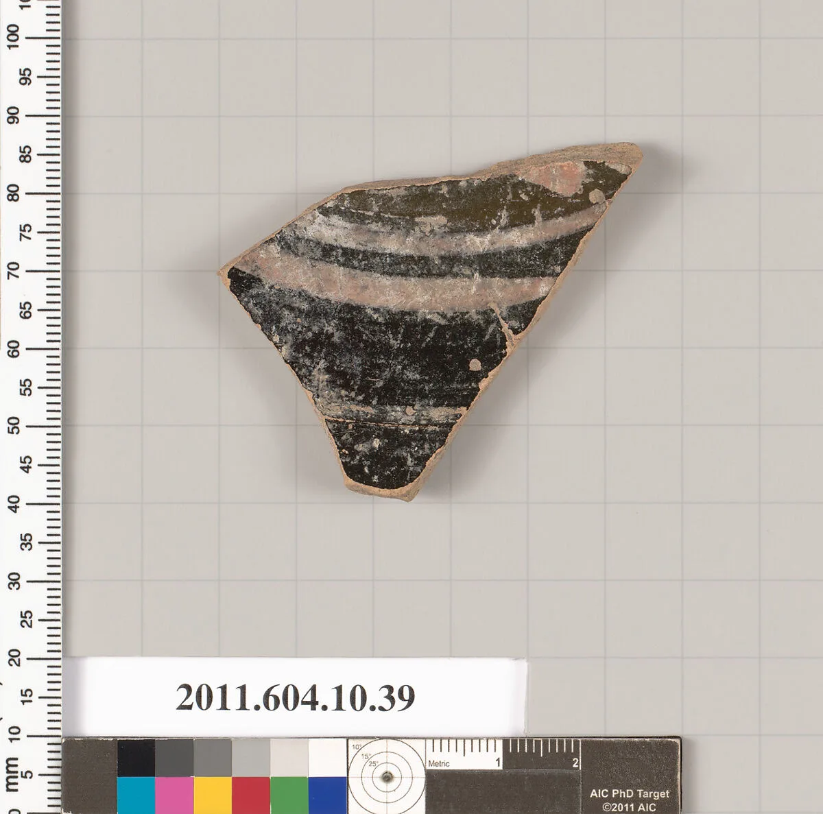 Terracotta fragment of a kylix (drinking cup)? — Unknown